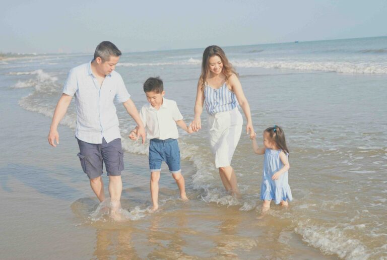 family by the beach